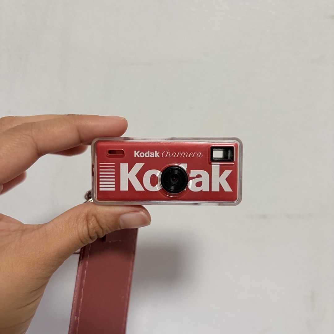 Kodak Charmera Red Digital Camera Keychain (Category: Cameras) located in Manila. Submitted by coegtrrz (Listing ID 1463715992, Image 1). Description: - Cute red Kodak Charmera camera - Features a clear protective case - Includes a convenient keychain strap - Small screen and buttons on the back - Fun, retro gadget perfect for on-the-go photos - camera, charger, case, & sd card.