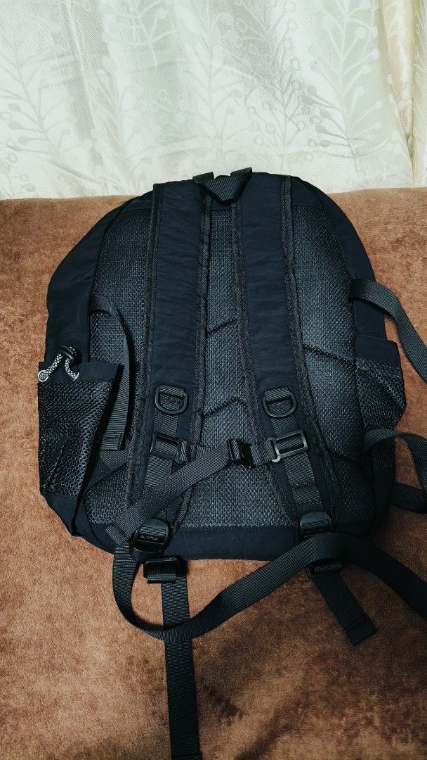 KOMILD Black Backpack with Reflective Cords (Category: Backpacks) located in Manila. Submitted by serenitycarlylle (Listing ID 1463725240, Image 2). Description: - KOMILD black backpack - Front bungee cords for extra storage/attachments - Side mesh pockets - Padded back and straps for comfort - Internal pockets in main compartment - Ideal for school, travel, or everyday use.