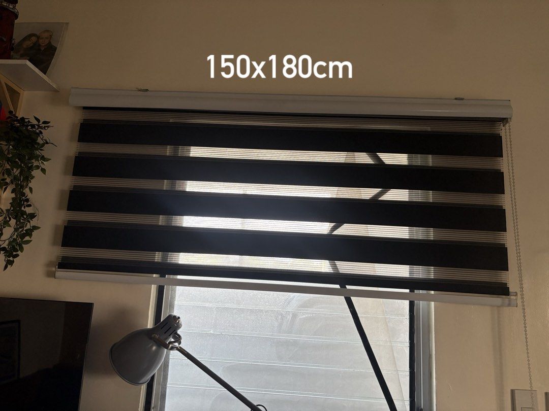 Korean blinds 150x180cm (Category: Curtains & Blinds) located in Makati City. Submitted by sseurekiii (Listing ID 1463720894, Image 1). Description: - Day & Night Blinds - Size: 150cm (width) x 180cm (length) - Color: Black and White Stripes - Provides privacy while allowing natural light - Easy to operate with a convenient pull chain - Suitable for any room in your home.