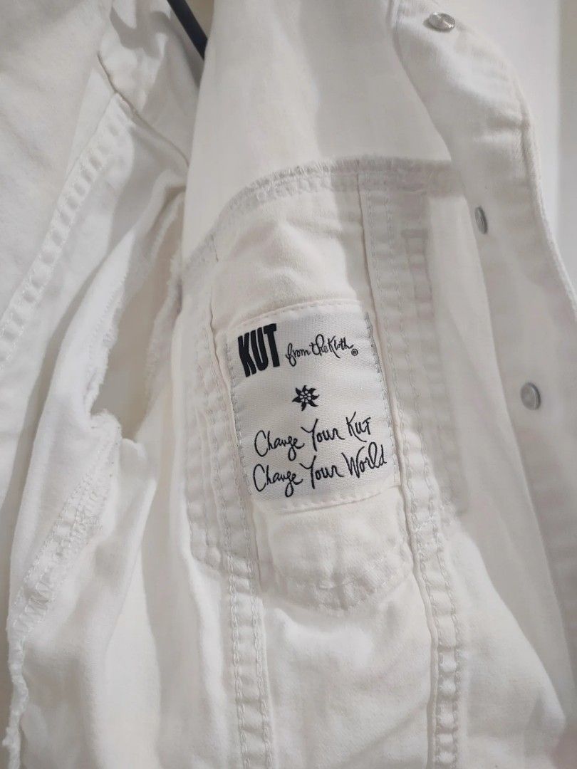 KUT from the Kloth White Denim Jacket Size M (Category: Coats, Jackets and Outerwear) located in Quezon City. Submitted by maxsab (Listing ID 1463676241, Image 2). Description: - Classic white denim jacket - Brand: KUT from the Kloth - Size: Medium (M) - Features: Button-up front, two chest pockets - Style: Versatile staple piece, easy to style with various outfits.