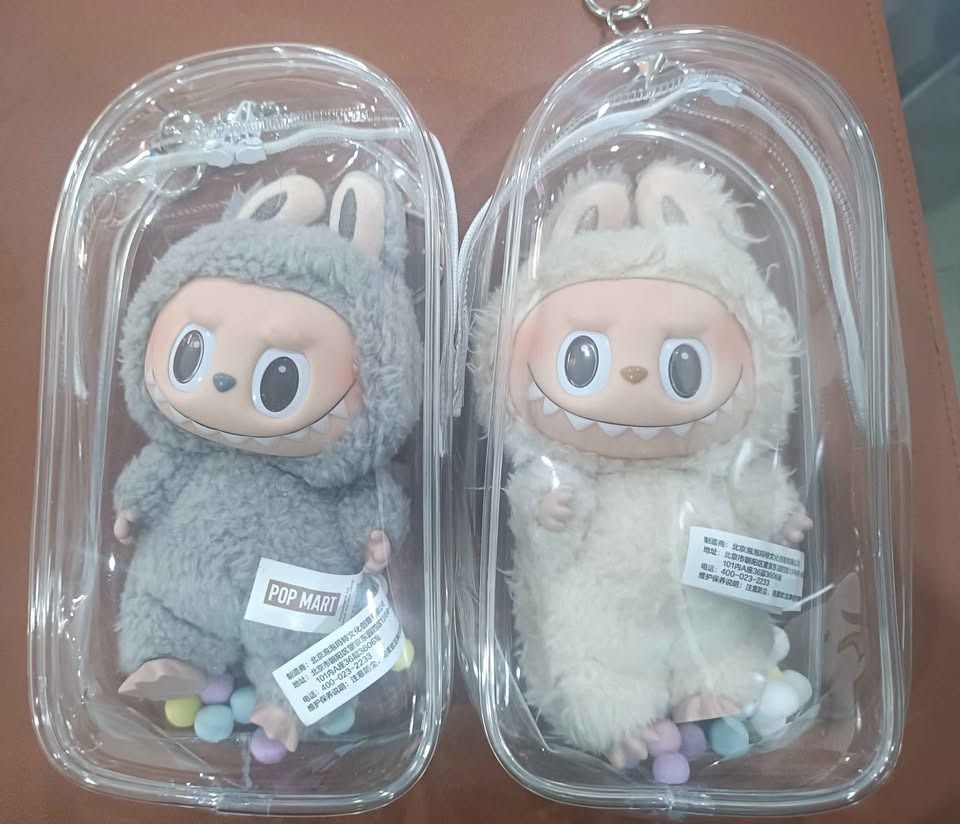 LABUBU [MODEL/SERIES] – [KEY DETAIL] 2pcs (Category: Plushies & Soft Toys) located in Quezon. Submitted by coolgoodvibes (Listing ID 1463655063, Image 1). Description: Authentic POP MART The Monsters plush keychains, received as gifts from the USA. ✨ Like New / Never Used ✔ Original POP MART tags ✔ Authenticity QR tag ✔ Includes 1 clear plastic protective holder for each piece ✔ No original box ✔ Clean and well-kept ✔ Never used by my kids Availa