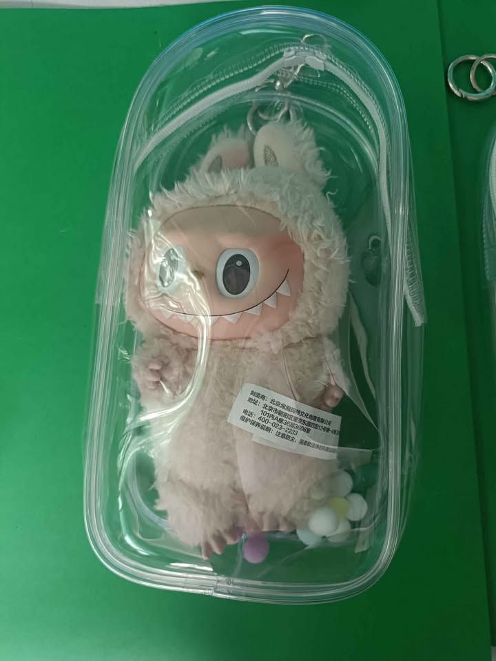 LABUBU [MODEL/SERIES] – [KEY DETAIL] 2pcs (Category: Plushies & Soft Toys) located in Quezon. Submitted by coolgoodvibes (Listing ID 1463655063, Image 2). Description: Authentic POP MART The Monsters plush keychains, received as gifts from the USA. ✨ Like New / Never Used ✔ Original POP MART tags ✔ Authenticity QR tag ✔ Includes 1 clear plastic protective holder for each piece ✔ No original box ✔ Clean and well-kept ✔ Never used by my kids Availa