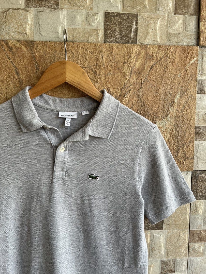 LACOSTE - SMALL LOGO DESIGN POLO SHIRT (Category: Tshirts & Polo Shirts ) located in Bacolod City. Submitted by timelessbyjosh (Listing ID 1463650444, Image 2). Description: BEST FOR CASUAL OUTFITS SIZE : 16 ACTUAL COLOR : HEATHER GREY COLOR RATE : 10 OUT OF 10 CONDITION : NEAR NEW MATERIAL : 100 % COTTON MADE IN : PERU FLAWS : NONE DIMENSIONS LENGTH - 24. 5 WIDTH - 18 BEST FIT XS TO SMALL ( MENS ) BEST FIT MEDIUM TO LARGE ( WOMENS ) MEASUREMENT 