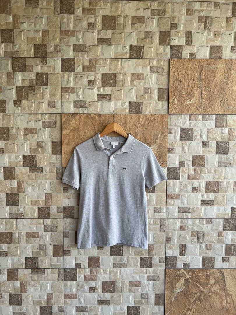 LACOSTE - SMALL LOGO DESIGN POLO SHIRT (Category: Tshirts & Polo Shirts ) located in Bacolod City. Submitted by timelessbyjosh (Listing ID 1463650444, Image 1). Description: BEST FOR CASUAL OUTFITS SIZE : 16 ACTUAL COLOR : HEATHER GREY COLOR RATE : 10 OUT OF 10 CONDITION : NEAR NEW MATERIAL : 100 % COTTON MADE IN : PERU FLAWS : NONE DIMENSIONS LENGTH - 24. 5 WIDTH - 18 BEST FIT XS TO SMALL ( MENS ) BEST FIT MEDIUM TO LARGE ( WOMENS ) MEASUREMENT 