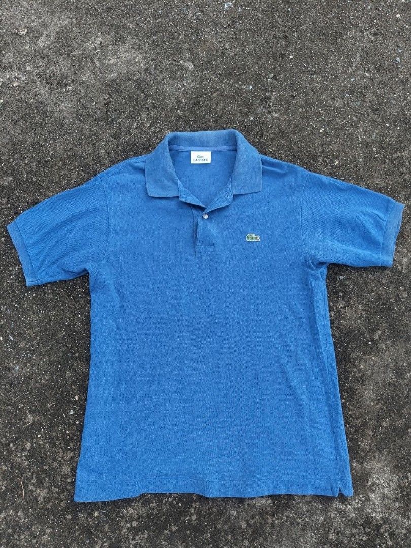 Lacoste Blue Polo Shirt (Category: Tshirts & Polo Shirts ) located in Manila. Submitted by dream_thrift (Listing ID 1463644278, Image 1). Description: - Classic blue Lacoste polo shirt - color rate 10/10 - good condition .
