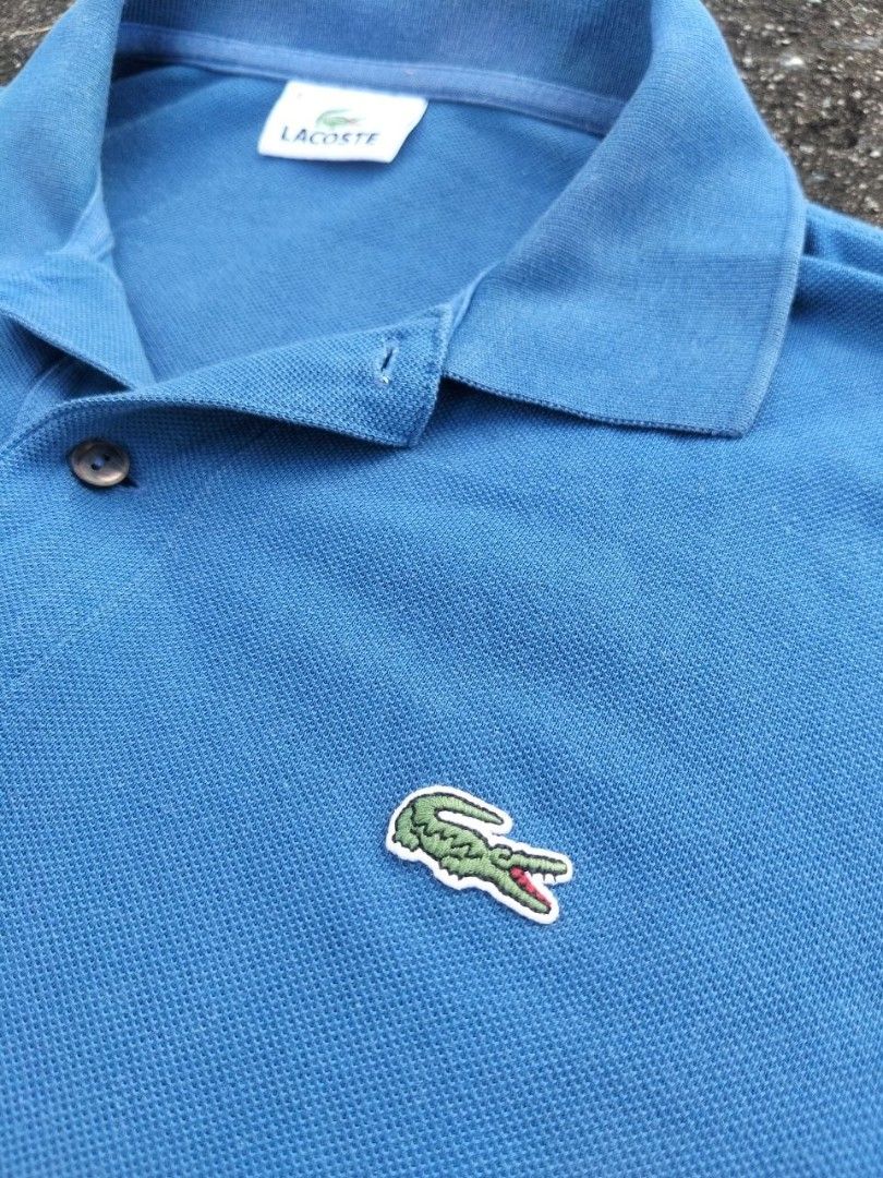 Lacoste Blue Polo Shirt (Category: Tshirts & Polo Shirts ) located in Manila. Submitted by dream_thrift (Listing ID 1463644278, Image 2). Description: - Classic blue Lacoste polo shirt - color rate 10/10 - good condition .