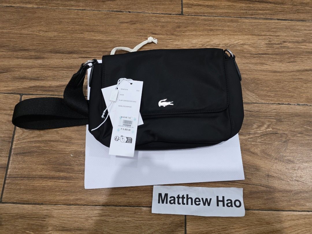 Lacoste FLAP CROSSOVER BAG (Category: Cross-body Bags) located in Manila. Submitted by machoxmatt (Listing ID 1463607475, Image 1). Description: brandnew mop:bdo/gcash shipping at buyer's expense.