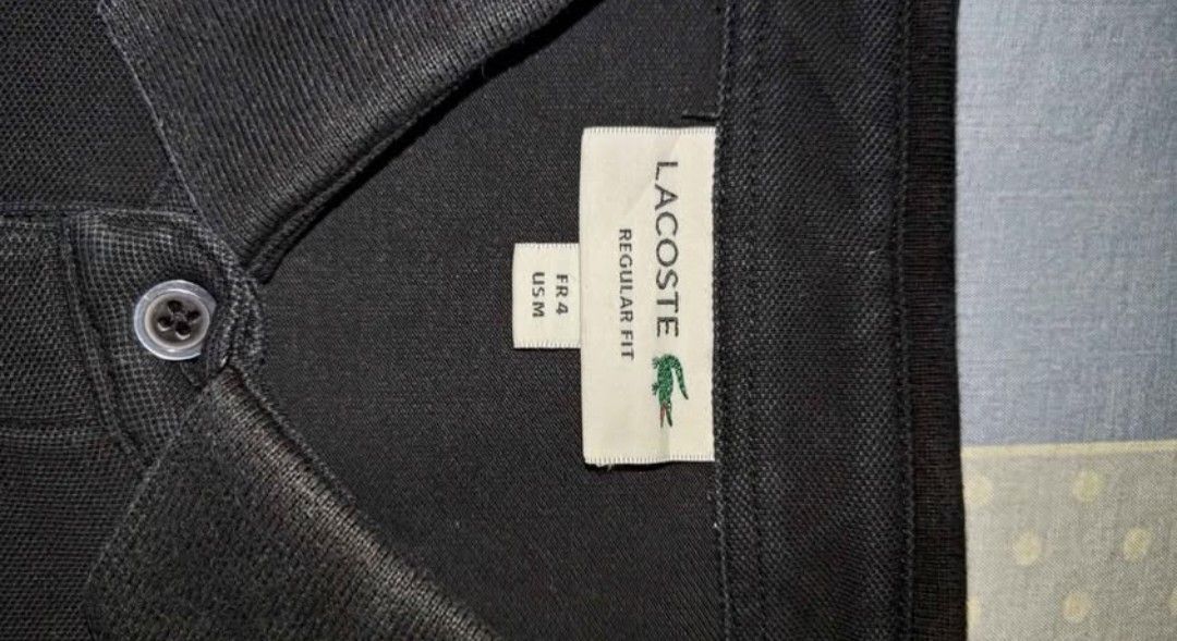 Lacoste Regular Fit Polo Shirt - Black (Category: Tshirts & Polo Shirts ) located in Manila. Submitted by 128105 (Listing ID 1463731885, Image 1). Description: - Brand: Lacoste - Color: Black - Fit: Regular - Size: FR4 / US M - Material: 100% Cotton - Condition: Brand new, in original packaging - Perfect for: Casual wear.