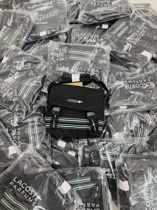 LACOSTE Sling Bag (Category: Sling Bags) located in Bulacan. Submitted by shopwithme_23 (Listing ID 1463646504, Image 2). Description: •Authentic GWP ₱2,100 onlyyy!!! (Lp na po yan, umaabot pa ng 3k+ benta ng iba diyan😭).