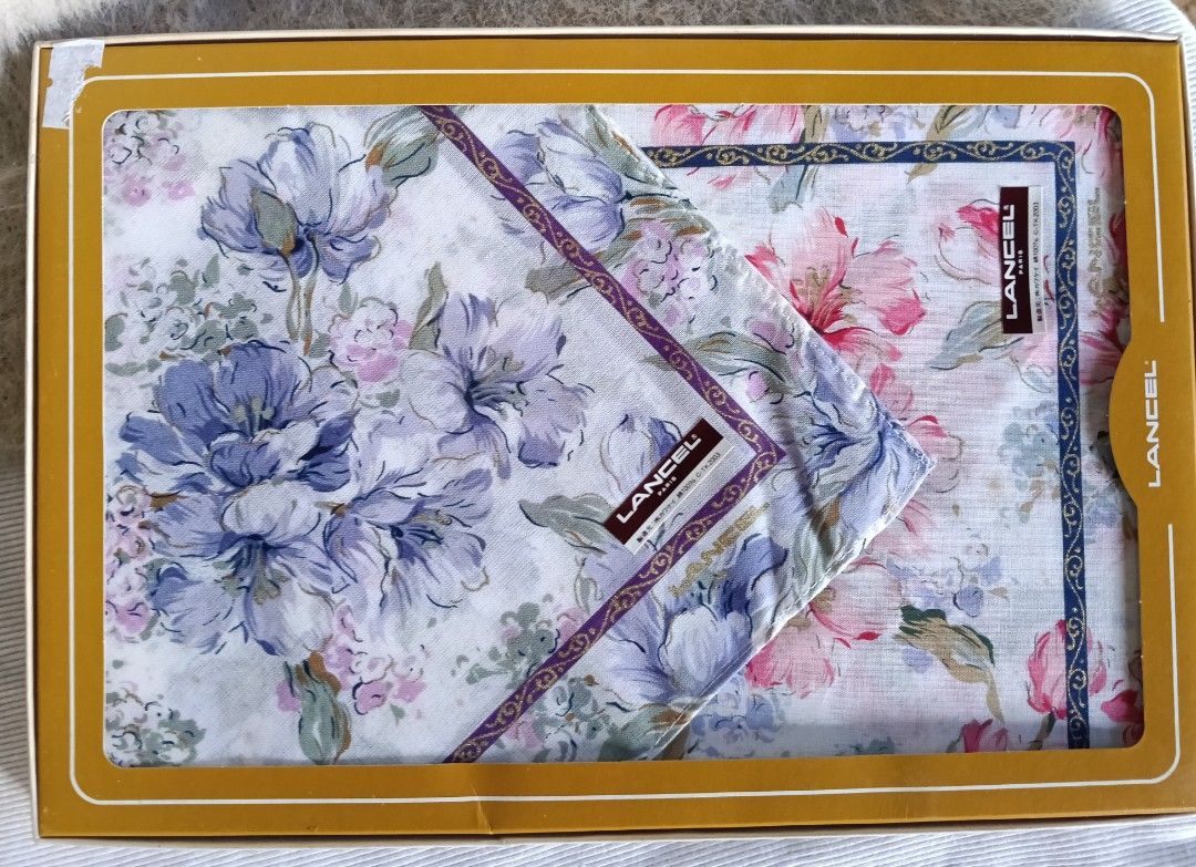 Lancel Floral Handkerchief Set (Category: Handkerchief & Pocket Squares) located in Antipolo. Submitted by vastgem_4c8da8 (Listing ID 1463579962, Image 2). Description: - Set of Lancel handkerchiefs - Features a beautiful floral print with purple and pink flowers - Includes nice border detail - Comes in original packaging - Ideal for gifting or personal use.