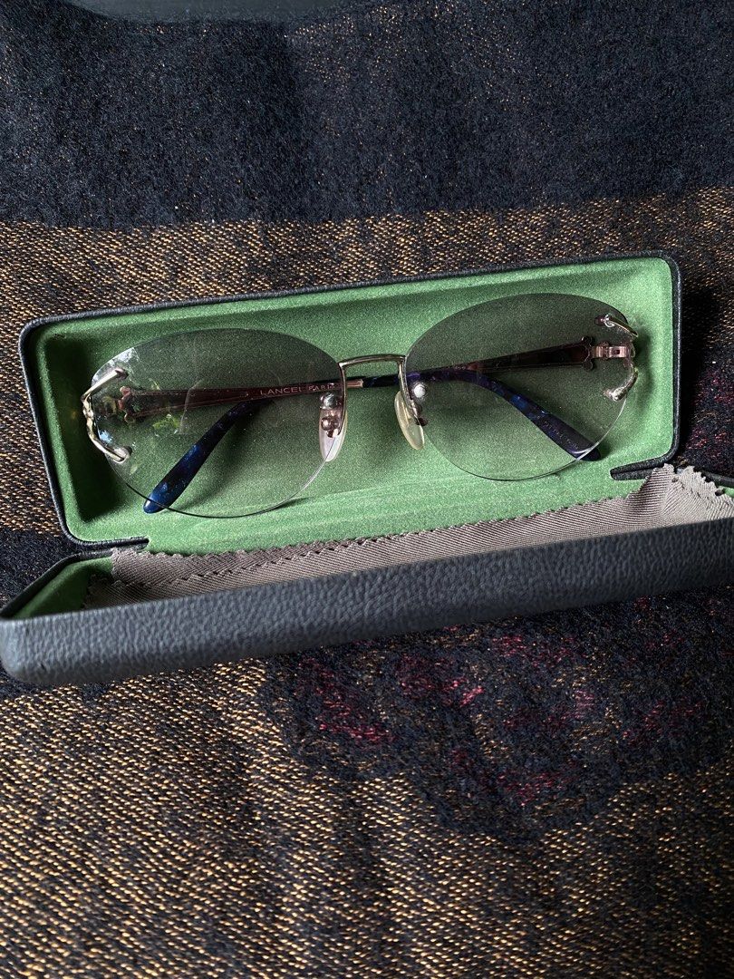 Lancel Paris rimless sunglasses (Category: Sunglasses & Eyewear) located in Candelaria. Submitted by bentablesetc (Listing ID 1463614841, Image 1). Description: Lancel Paris rimless sunglasses. 1300 + sf MOP: Gcash Courier: J&t Loc: Candelaria Quezon.