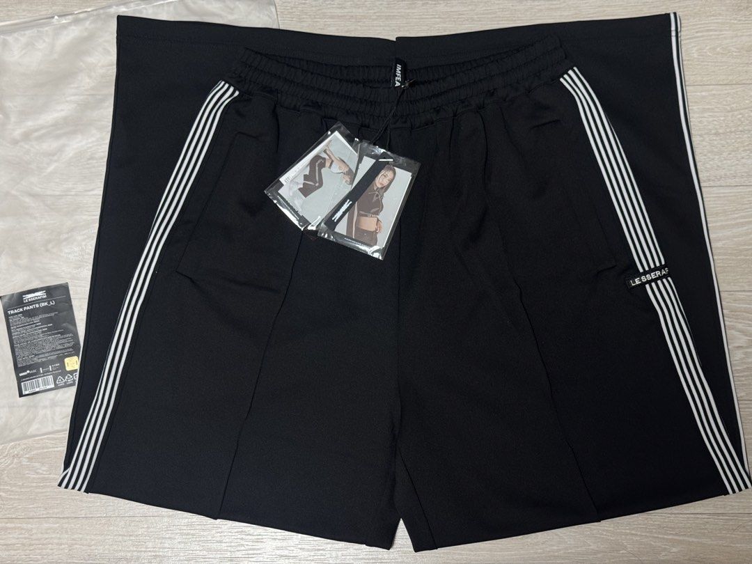 LE SSERAFIM Official Large Track Pants (Black) (Category: Other Bottoms) located in Bulacan. Submitted by zanreionlineshp (Listing ID 1463714034, Image 1). Description: RFS: I was in such a rush to check out during the Weverse Webday Sale that I only realized afterward that I ordered the wrong size. 😭 So I need to resell this at the exact same price I paid for it. 🥲 NOTE: This item is only available in a Large size, and the last one in stock is
