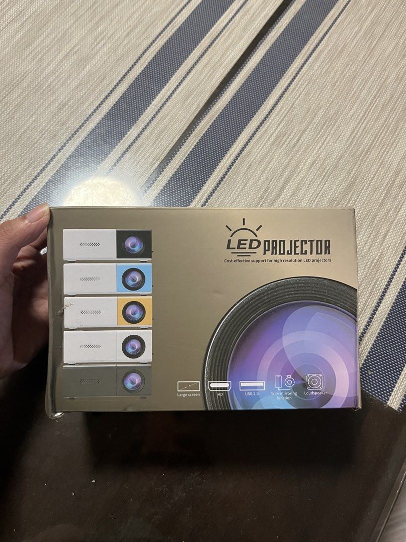 LED Mini Projector with Remote (Category: Projectors) located in Iloilo. Submitted by chrssjhn_ (Listing ID 1463675045, Image 2). Description: - Mini LED Projector - High-Resolution Projection - Compact & Portable Design - Includes Remote Control - Connect via USB or SD Card - Ideal for Home Entertainment 📍Sambag, Jaro, Iloilo City MOP: GCash, GoTyme, COD MOD: Pickup Note: Pickup fee will be shouldered by the buyer..