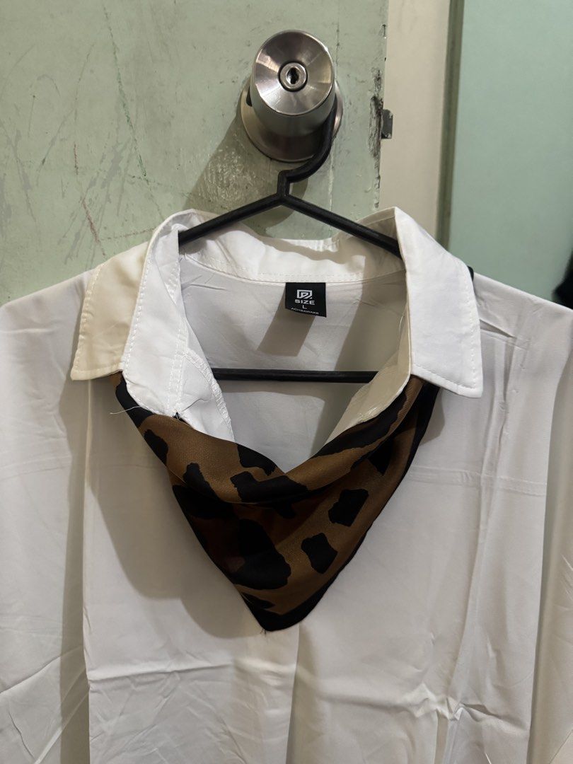 Leopard Print Silk Scarf Accessory (Category: Scarves) located in Quezon City. Submitted by big_fat_momma (Listing ID 1463573924, Image 3). Description: - Eye-catching leopard print scarf - Silky smooth feel - Versatile: wear on neck or tie to your bag - Adds a stylish pop of pattern to any outfit - Approximate dimensions: 67cm x 68cm - Ideal accessory for everyday use - Add safari touch to your outfit. #safari #animalprint #scarf #leopardprint.