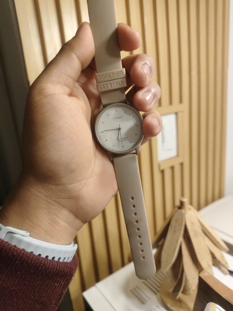 Lifesavior Watch - Together Let's Help Edition (Category: Women's Watches) located in Mabalacat. Submitted by dam-sun (Listing ID 1463644404, Image 1). Description: - Lifesavior watch - Beige strap with 'TOGETHER LET'S HELP' print - Simple and clean watch face - Ideal for everyday wear - Nice accessory.