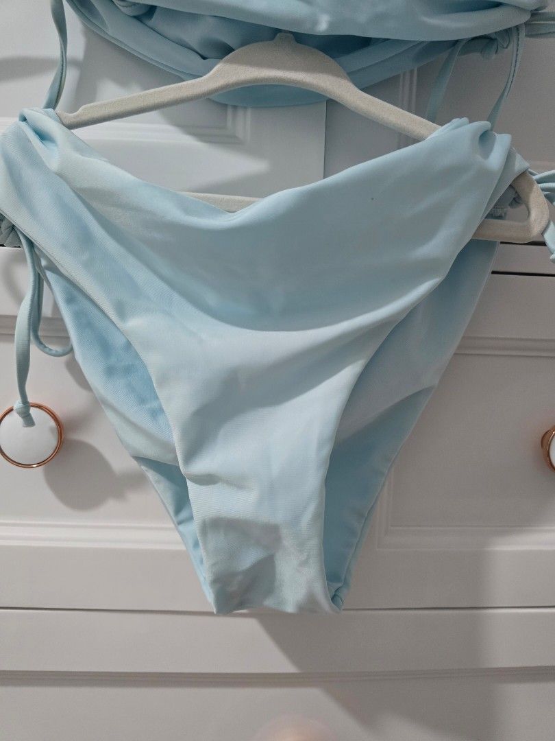 Light Blue Bikini Set with Tie Details (Category: Bikinis & Swimsuits) located in Arayat. Submitted by polenbi15 (Listing ID 1463582542, Image 2). Description: - Cute light blue bikini set - Top features adjustable tie straps and ruching - Bottoms have adjustable tie sides - Ideal for the beach or pool - Perfect for your next vacation!.