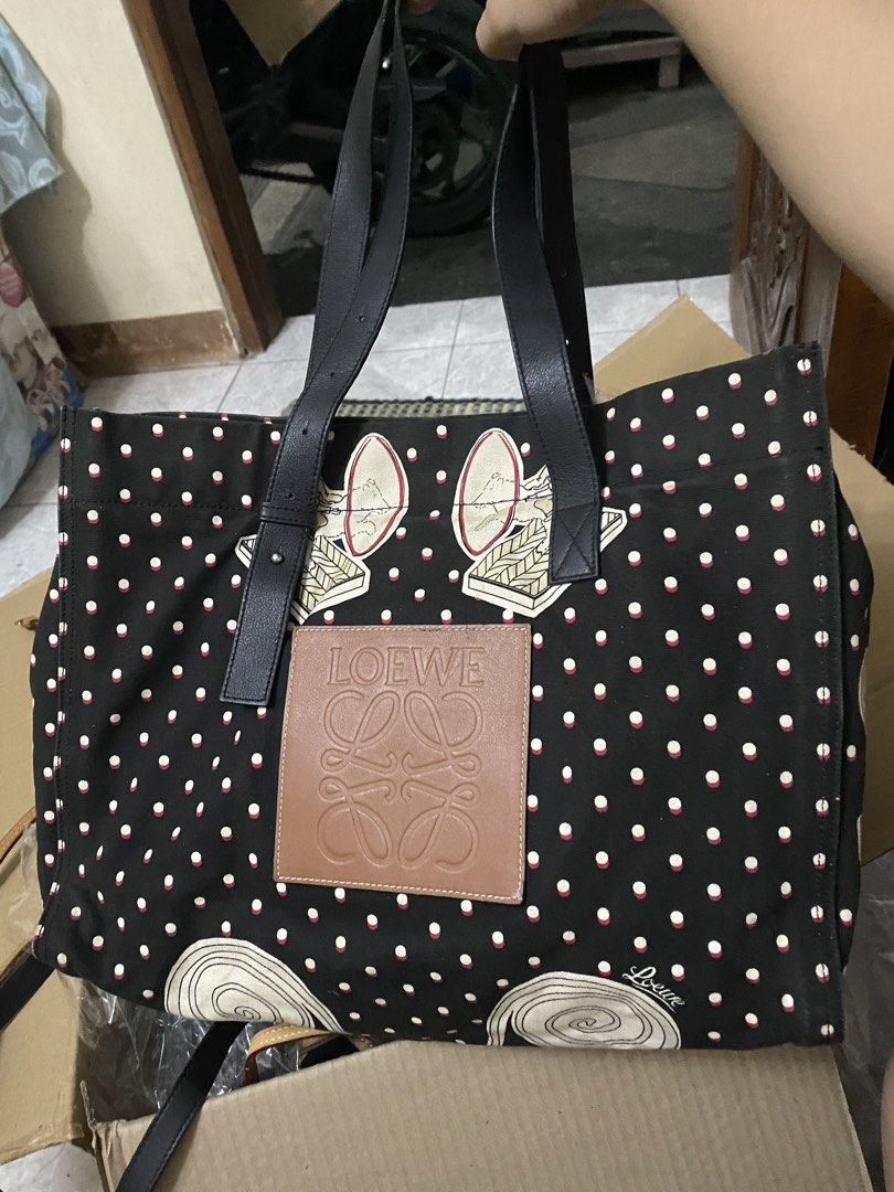 Loewe Paula's Ibiza Black Polka Dot Canvas Tote Bag (Category: Luxury Bags & Wallets) located in Cavite. Submitted by rmquin05 (Listing ID 1463677708, Image 1). Description: - Authentic Loewe Paula's Ibiza Collaboration Tote Bag - Material: Black canvas with white and red polka dot print - Features: Leather trim and handles - Interior: Zipper pocket and leather tags (Loewe/Paula's branding, serial number) - Ideal for everyday use.