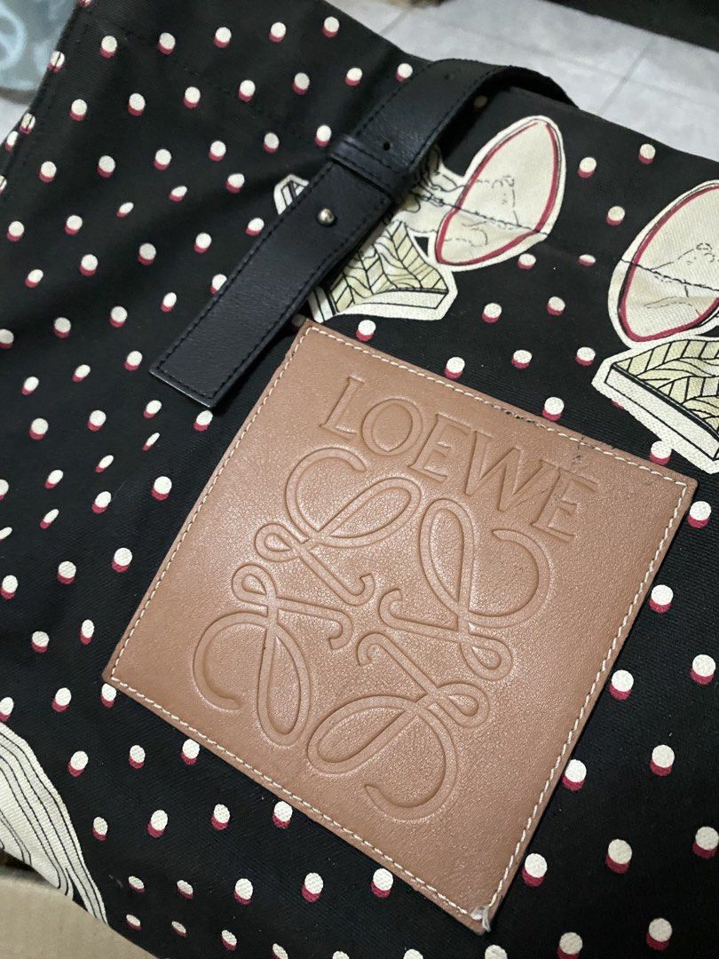 Loewe Paula's Ibiza Black Polka Dot Canvas Tote Bag (Category: Luxury Bags & Wallets) located in Cavite. Submitted by rmquin05 (Listing ID 1463677708, Image 2). Description: - Authentic Loewe Paula's Ibiza Collaboration Tote Bag - Material: Black canvas with white and red polka dot print - Features: Leather trim and handles - Interior: Zipper pocket and leather tags (Loewe/Paula's branding, serial number) - Ideal for everyday use.