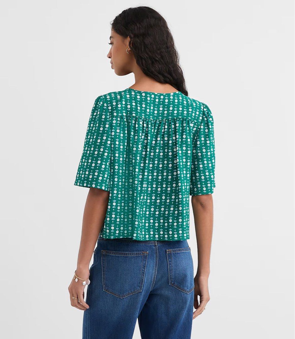 LOFT Petite Floral Bow Blouse - Evergreen (Category: Blouses) located in Taguig. Submitted by floweringggg (Listing ID 1463626272, Image 3). Description: - Green petite blouse - White floral pattern - Tie-front closure - Short puff sleeves - Versatile: can be tied or worn open - Dress up or down - Brand: LOFT RFS: to big for me. could fit medium to large.