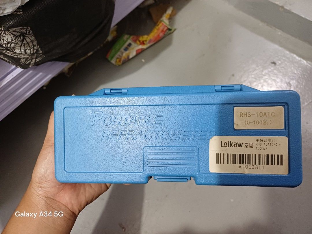 Loikaw Portable Refractometer RHS-10ATC (0-100%) (Category: Medical Supplies & Tools) located in Quezon City. Submitted by and_reaaaa11 (Listing ID 1463564866, Image 1). Description: - Portable refractometer in a blue case - Measures 0-100% concentration - Ideal for checking sugar content or salinity - Includes a dropper - Comes in its original case.