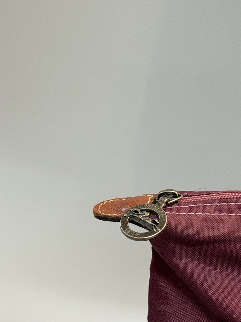 Longchamp (Category: Tote Bags) located in Cebu City. Submitted by ricahsukaybags_2017 (Listing ID 1463627617, Image 3). Description: Longchamp tophandle. Sign of used only no bubbles near large size.