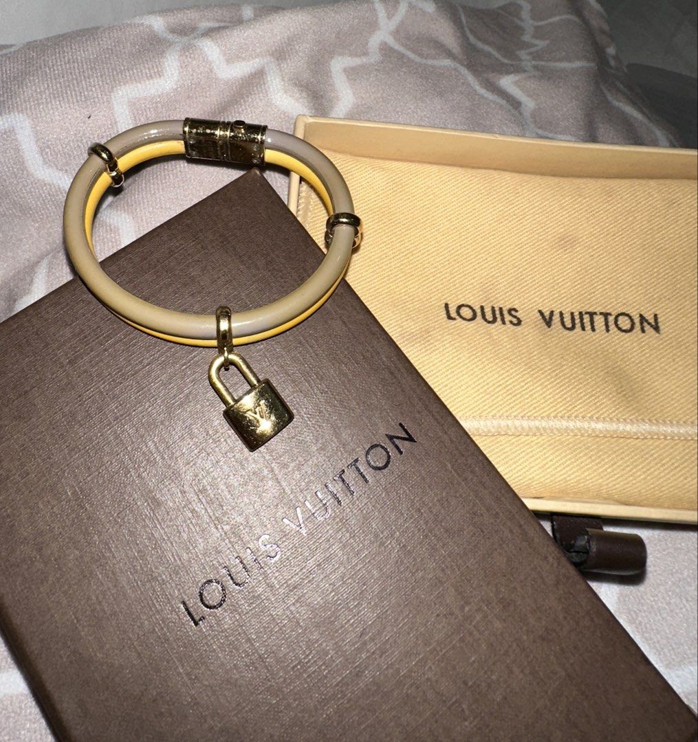 Louis Vuitton Bracelet (Category: Bracelets) located in Manila. Submitted by pmrshops1 (Listing ID 1463609981, Image 3). Description: - Authentic Louis Vuitton bracelet - Louis Vuitton Keep It Twice leather bracelet - Iconic LV lock charm - Secure magnetic clasp closure - Comes with original Louis Vuitton box and pouch - Adds a stylish pop of color to any outfit.