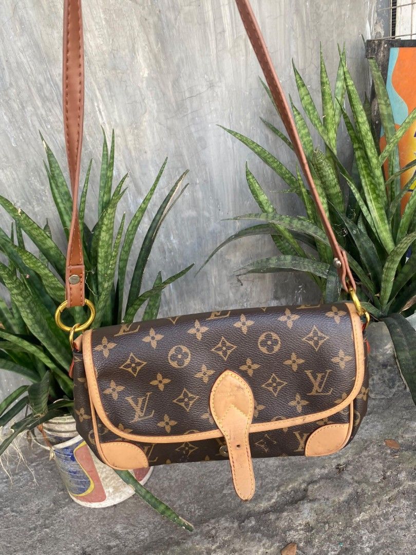 Louis Vuitton Monogram Canvas Crossbody Bag (Category: Luxury Bags & Wallets) located in Bacolod City. Submitted by carlo1019 (Listing ID 1463611954, Image 1). Description: - Authentic Louis Vuitton crossbody bag - Classic monogram canvas with tan leather trim and strap - Gold hardware - Interior is lined - Made in France - Date code: MB1252 - Ideal everyday bag.