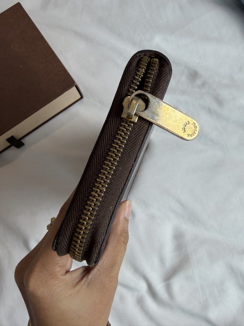 LOUIS VUITTON MONOGRAM LONG WALLET ZIPPY ORGANIZER (Category: Luxury Bags & Wallets) located in Makati City. Submitted by moiobsession (Listing ID 1463636490, Image 3). Description: authentic can fit iphone and passport.