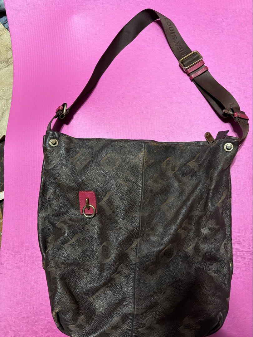 Louis Vuitton Monogram Shoulder Bag (Category: Luxury Bags & Wallets) located in Manila. Submitted by salvadorsh41571 (Listing ID 1463703341, Image 1). Description: - Authentic Louis Vuitton shoulder bag - Classic monogram pattern - Adjustable strap with LV branding - Pink accent detail with D-ring - Minor signs of wear on leather and strap - Ideal for everyday use.