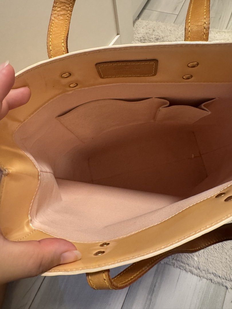 Louis Vuitton Monogram Vernis Tote Bag (ORIGINAL) (Category: Luxury Bags & Wallets) located in Antipolo. Submitted by nathshn_ (Listing ID 1463656137, Image 2). Description: - Authentic Louis Vuitton Monogram Vernis tote bag - Chic light pinkish hue - Durable leather handles and trim - Functional interior pockets - Elegant gold hardware details - Crafted in France - Ideal for everyday elegance and practicality Flaw: Has pen stains inside (bottom 