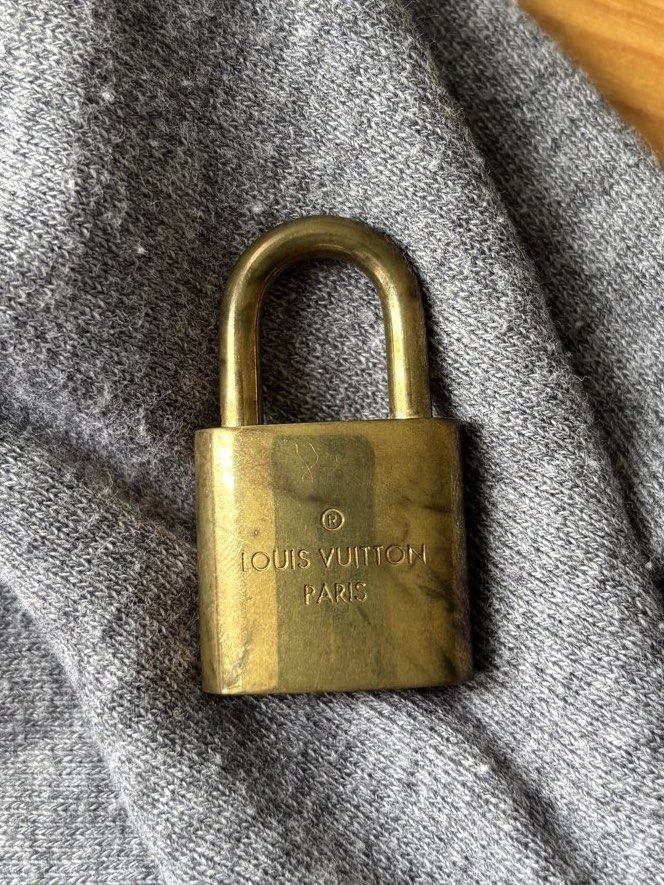 Louis Vuitton padlock and key set (Category: Luxury Bags & Wallets) located in Quezon City. Submitted by saveproject (Listing ID 1463388470, Image 2). Description: Complete set. One padlock and 2 matching keys, in its original box. Lock/Key Code: Number 433 Material: solid heavy brass 16 years old. New old stock. Never used. No haggling. Price posted is final. .