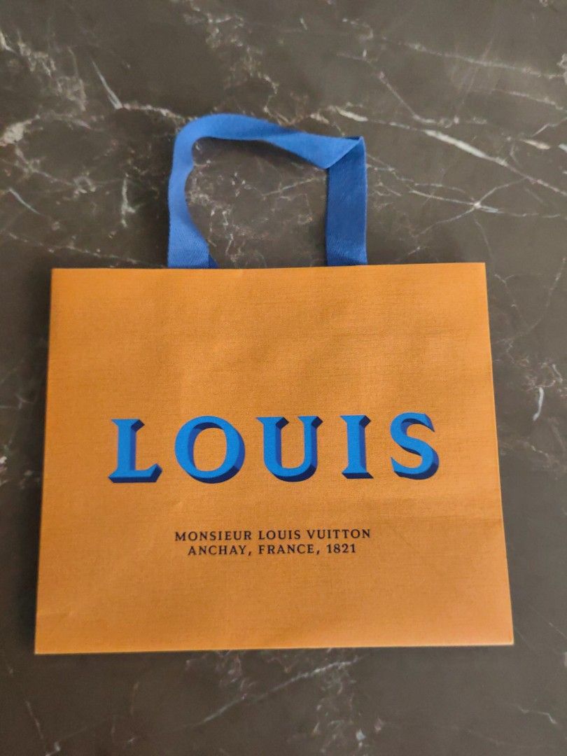 Louis Vuitton Shopping Bag (Category: Luxury Accessories) located in Makati City. Submitted by kruelscloset (Listing ID 1463601733, Image 1). Description: - Authentic Louis Vuitton paper bag - Dimensions: Approximately 10 inches (length) x 6inches (width) x 8 inches (height) - Ideal for storing small valuables or as a luxurious gift box.