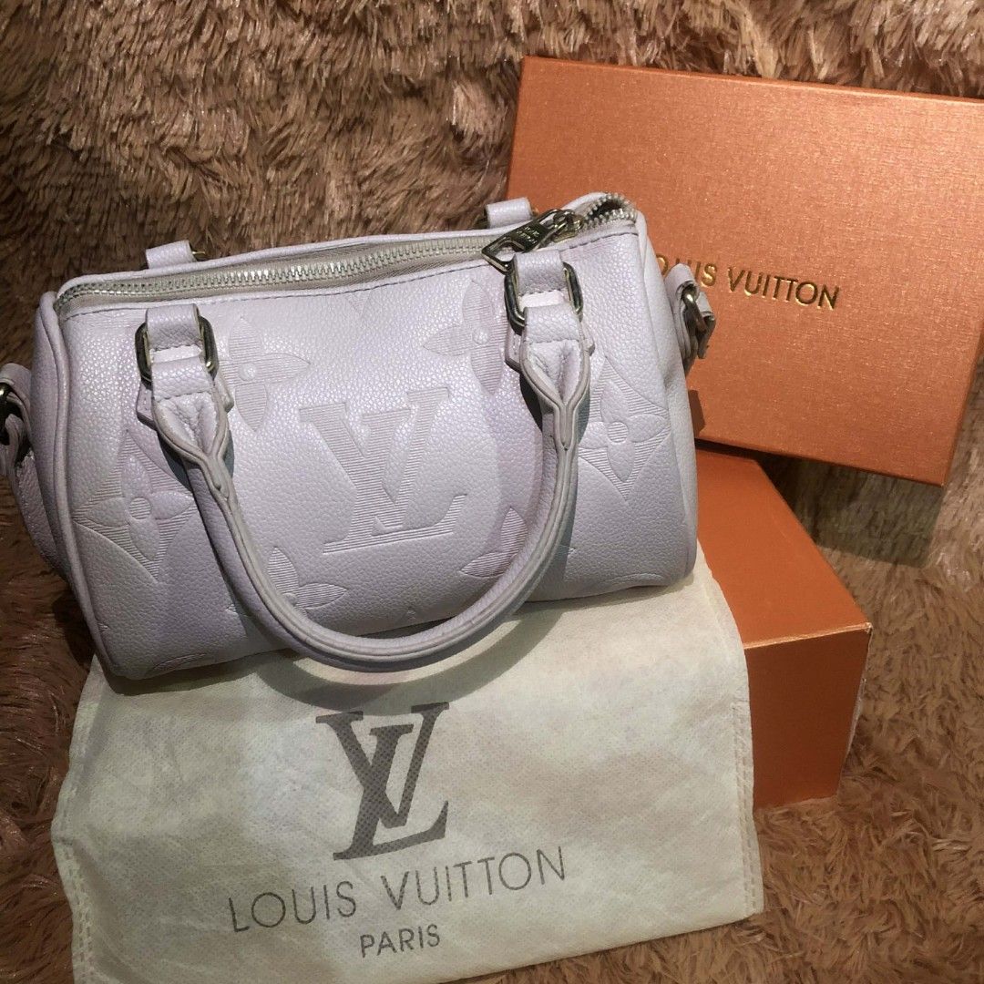 Louis Vuitton Speedy Monogram Empreinte Leather Handbag (Category: Luxury Bags & Wallets) located in Manila. Submitted by ladyfashion.ph (Listing ID 1463671258, Image 1). Description: - Authentic Louis Vuitton Speedy Bag - Material: Monogram Empreinte Leather - Color: Soft Lilac - Closure: Zipper - Includes: Dust bag and original box - A classic and timeless piece.