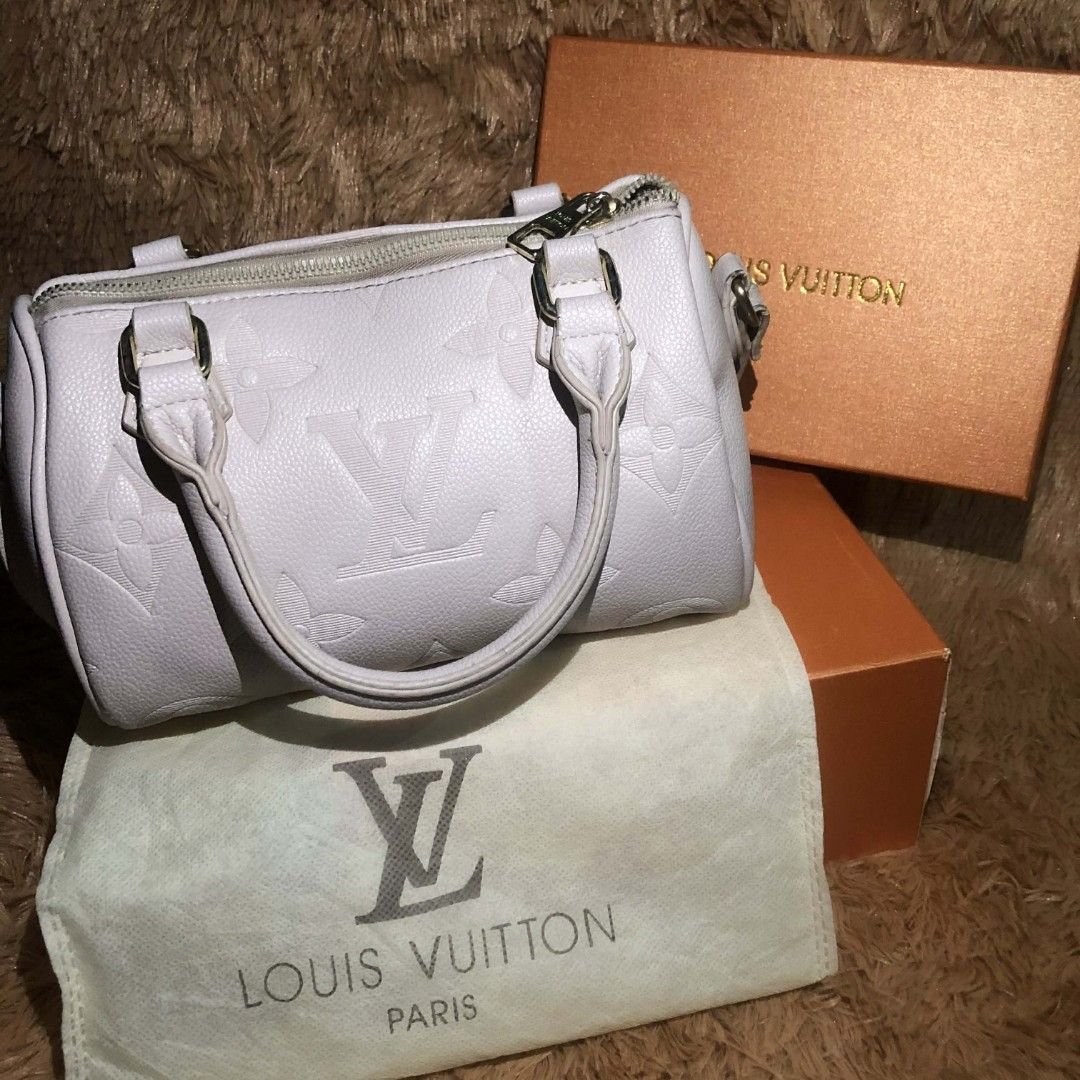 Louis Vuitton Speedy Monogram Empreinte Leather Handbag (Category: Luxury Bags & Wallets) located in Manila. Submitted by ladyfashion.ph (Listing ID 1463671258, Image 3). Description: - Authentic Louis Vuitton Speedy Bag - Material: Monogram Empreinte Leather - Color: Soft Lilac - Closure: Zipper - Includes: Dust bag and original box - A classic and timeless piece.