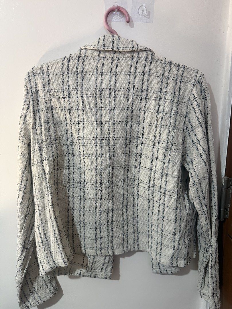 Lovito Tweed Cropped Jacket (Category: Coats, Jackets and Outerwear) located in Quezon City. Submitted by shuartcake (Listing ID 1463697683, Image 2). Description: - Cute cropped tweed jacket from Lovito - White with navy blue plaid pattern - Features two front pockets - Stylish gold button details - Ideal for layering over tops for a chic look - Only used once.
