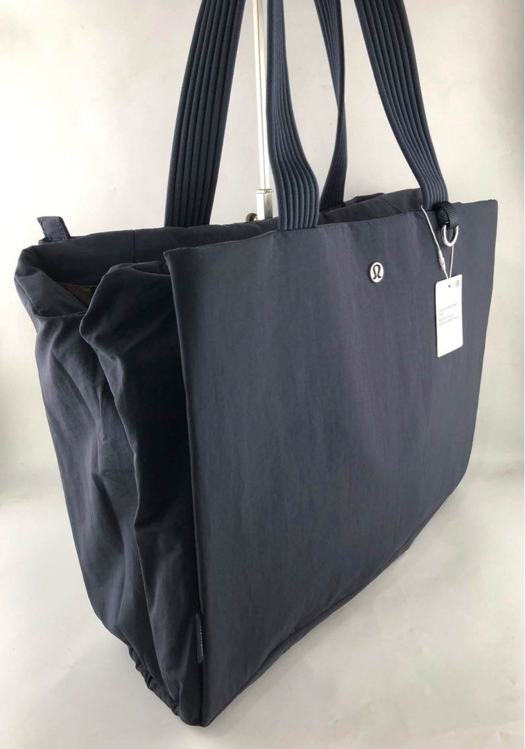 Lululemon Triple Compartment Tote Bag (Category: Shoulder Bags) located in Binan City. Submitted by pinkykeenshop (Listing ID 1463686352, Image 2). Description: .