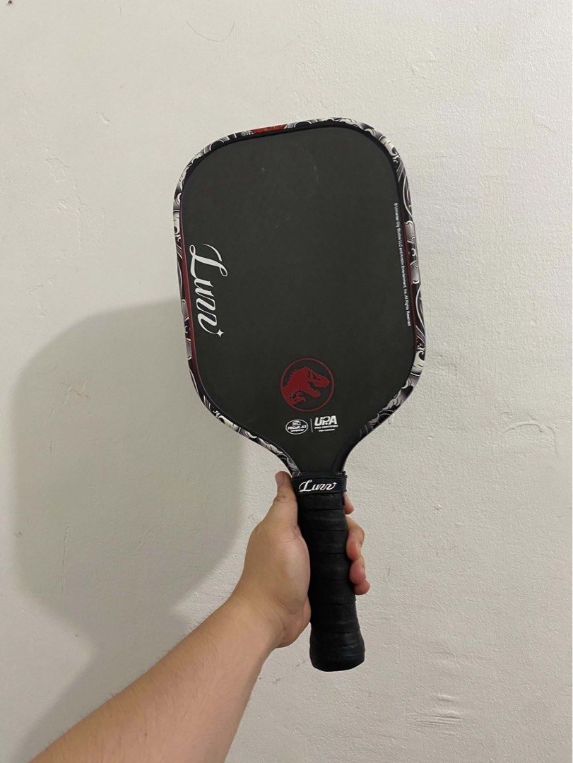 Luzz Cannon Jurassic World 16mm (Category: Racket and Ball Sports) located in General Trias. Submitted by coc_ph (Listing ID 1463670342, Image 2). Description: HELPING A FRIEND Luzz Cannon Pro Jurassic World 🦖 - Bought Last May 2026 sa Luzz 🍊 Official Account (Can send proof) - Used in OP only (8-10 OPs only) - 9/10 good condition - Extra paddle since nag upgrade sa Triton na last July. - With free paddle sleeve ✨ PM for more info. Cavite Loc. 