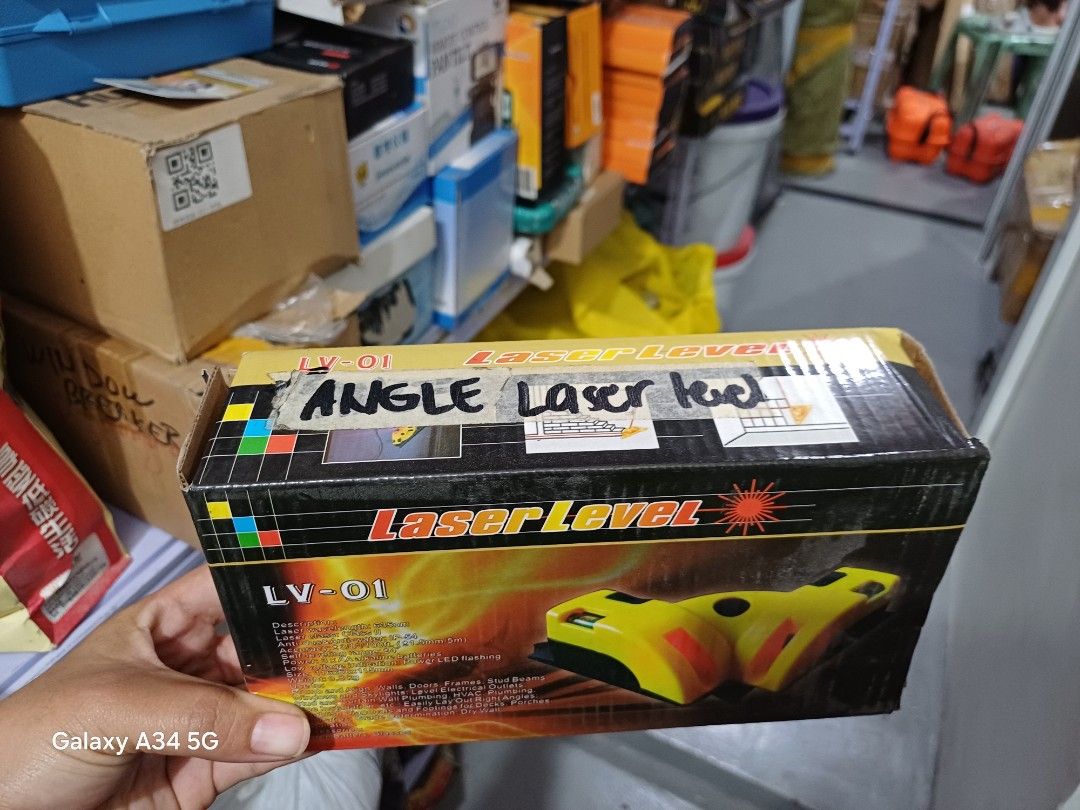 LV-01 Angle Laser Level Tool (Category: Announcements) located in Quezon City. Submitted by and_reaaaa11 (Listing ID 1463563677, Image 2). Description: - Model: LV-01 Angle Laser Level - Projects: Horizontal and vertical laser lines - Ideal for: Hanging pictures, installing shelves, general DIY tasks - Includes: Laser level and accessories - Perfect for: Home improvement projects.