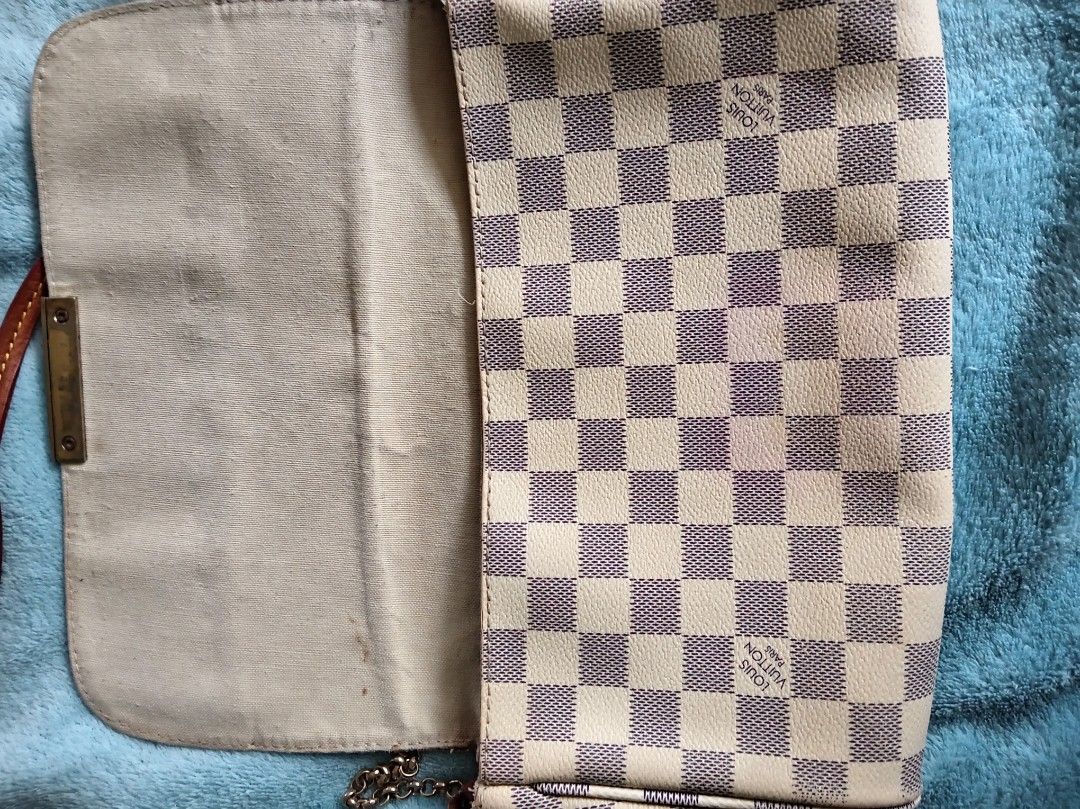 LV Favorite 2 way (Category: Luxury Bags & Wallets) located in Malolos. Submitted by shoptokyothrift (Listing ID 1463596248, Image 3). Description: LV favorite 2 way As is Damier Azur With minimal discoloration Please check all photos carefully Japan sourced Sale Coded.