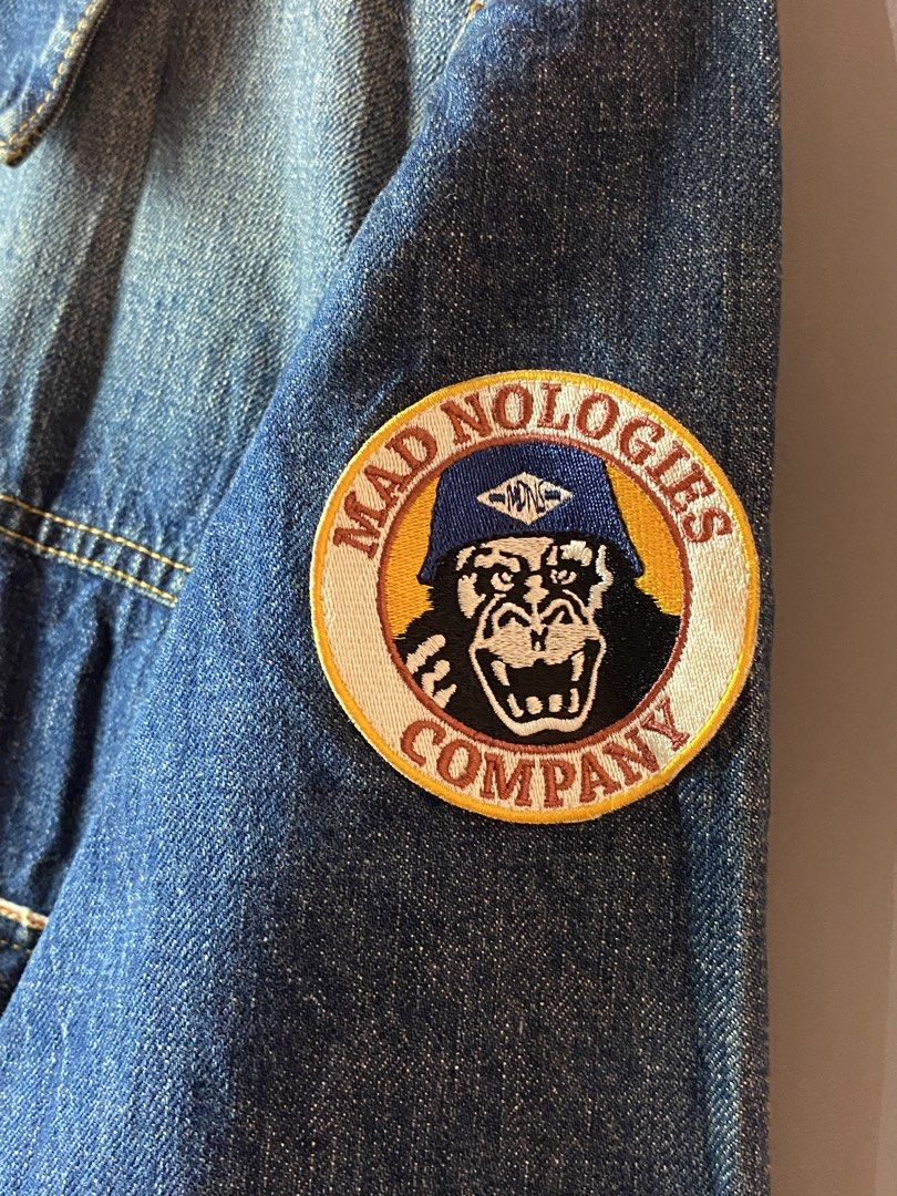 Madness Patch Denim Jackets (Category: Coats, Jackets and Outerwear) located in Quezon City. Submitted by loloyz123 (Listing ID 1463692085, Image 3). Description: Madness Patch Denim Jackets Condition: Very good Color rate: 9.8/10 Color: denim Size: Large L: 27 W: 21 inches.