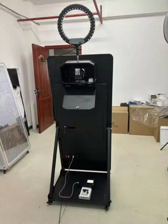 Magic Mirror Photo Booth with Canon DSLR and Printer (Category: Cameras) located in Manila. Submitted by kitsincph (Listing ID 1463695401, Image 2). Description: - Complete Magic Mirror Photo Booth setup - Includes: Mirror booth, Canon EOS 2000D DSLR camera, photo printer with ink - Also includes: Ring light and foot pedal - Ready for events and parties - Ideal for capturing unforgettable memories.