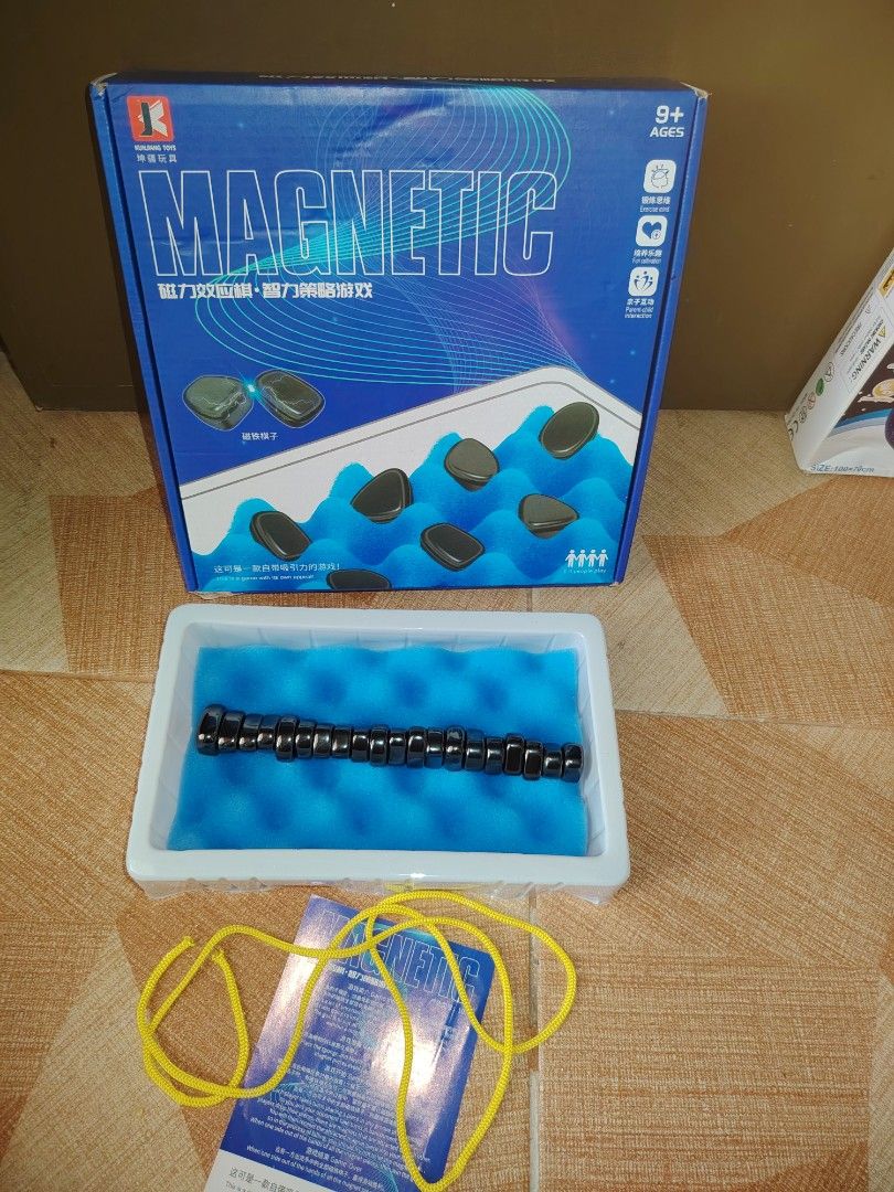 Magnetic Chess Game (Category: Educational & Learning Toys) located in Santiago. Submitted by aceheart0118672 (Listing ID 1463618790, Image 1). Description: - Fun magnetic building blocks game - Develops strategic thinking and creativity - Suitable for 1-4 players - Includes magnetic pieces, yellow string, and storage pouch - Recommended for ages 9+ - Great for keeping kids entertained and learning.