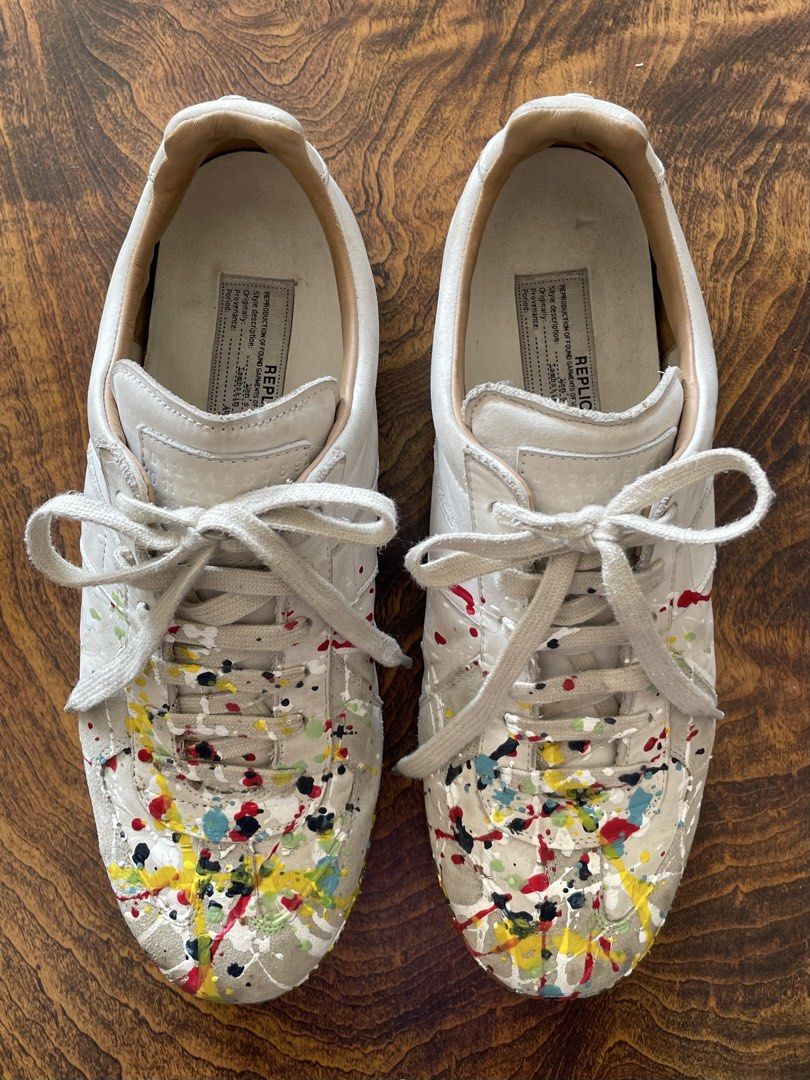 Maison Margiela Replica Paint Splatter Sneaker (Category: Sneakers) located in San Fernando. Submitted by larchivefeminine (Listing ID 1463584710, Image 1). Description: Maison Margiela Replica Paint Splatter Sneaker GOOD CONDITION Signs Of Wear (see photos) No major flaws Calfskin SIZE 41 on Tag .