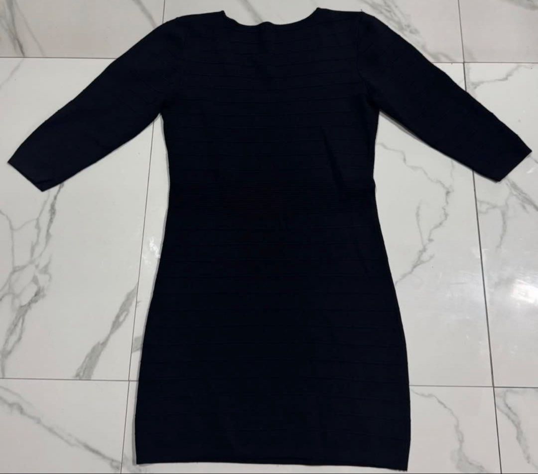 Mango Basic Black Ribbed 3/4 Sleeve Bodycon Dress (Category: Dresses) located in Pasay City. Submitted by szepter (Listing ID 1463677350, Image 3). Description: - Brand: Mango Basic - Style: Black bodycon dress - Texture: Ribbed all over - Sleeves: 3/4 length - Neckline: Scoop neck - Length: Above the knee (approx. 33 inches) - Waist: Approx. 26 inches - Versatility: Perfect for dressing up or down.