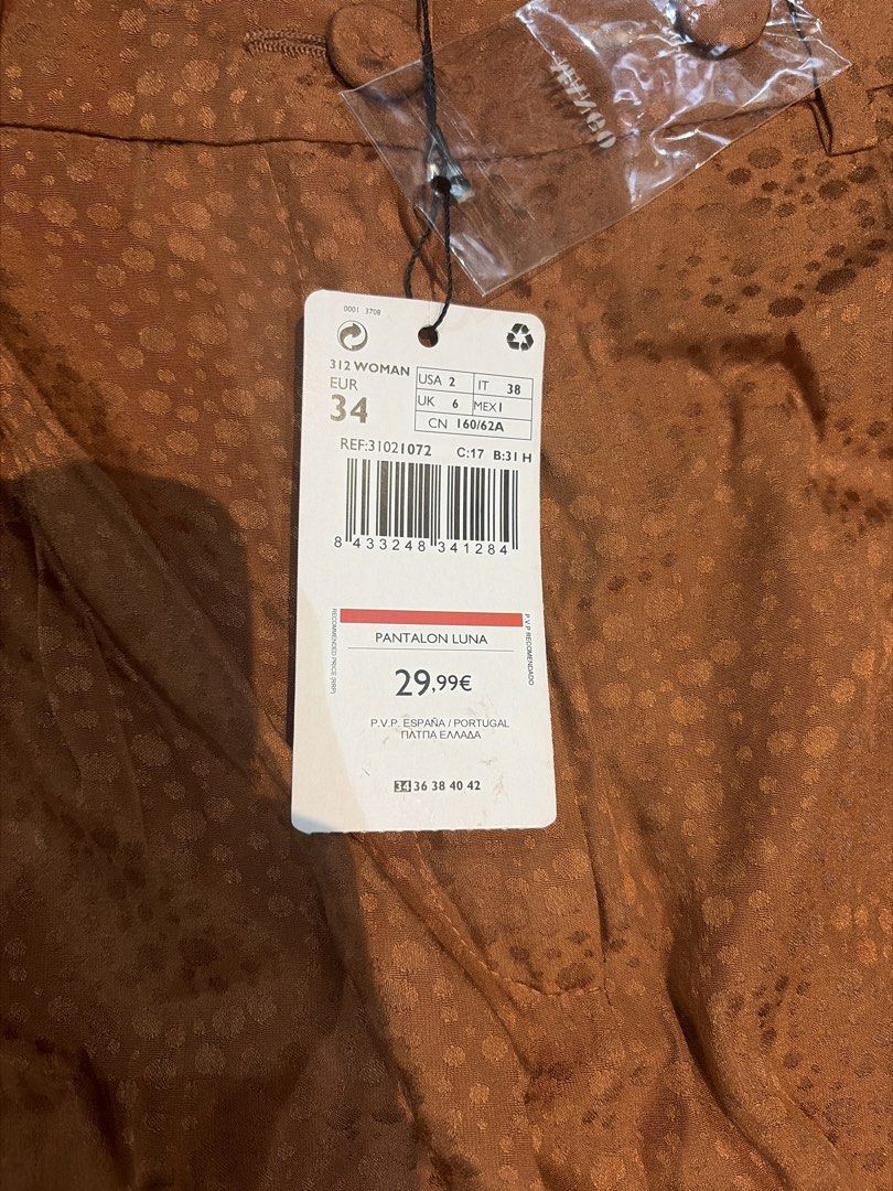 Mango co ords (Category: Sets or Coordinates) located in Las Pinas. Submitted by sharine0518 (Listing ID 1463557764, Image 3). Description: Brand new mango Store bought Lose top in xs Pants size 34 .