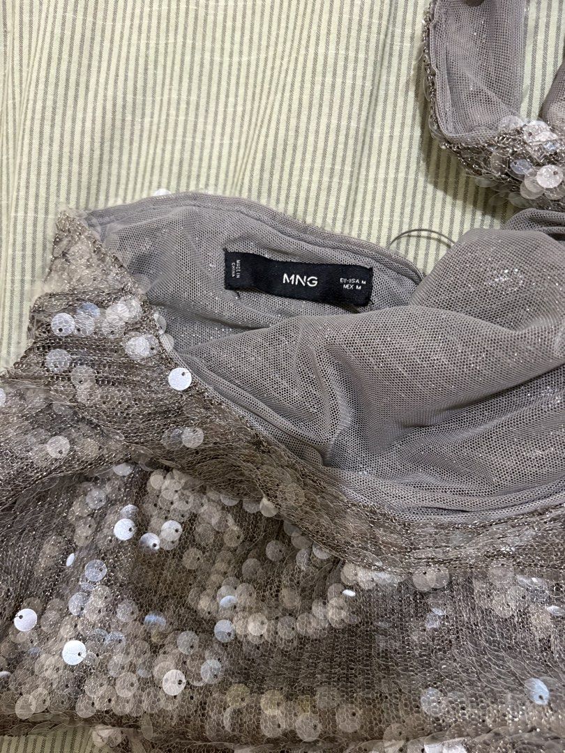 MANGO Sequin Halter Neck Top (Medium) (Category: Sleeveless) located in Manila. Submitted by 0010fia (Listing ID 1463617342, Image 3). Description: - never worn - not my size - really pretty going out top!.