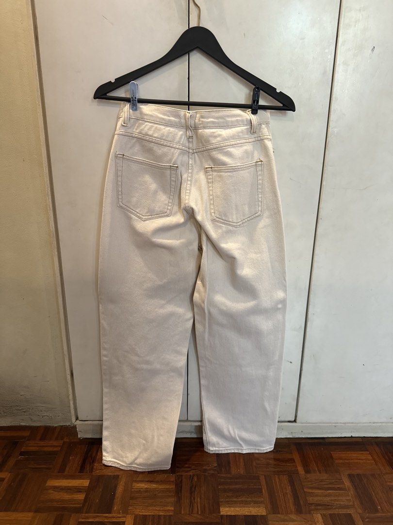 Mantou Cream Straight Leg Jeans (Category: Jeans) located in Manila. Submitted by andromedanny (Listing ID 1463611428, Image 3). Description: - Cream colored wide leg jeans - Brand: Mantou (Local!) - Closure: Button and zip - Pockets: Two front, two back - Detail: Brown stitching - RFS: Decluttering.