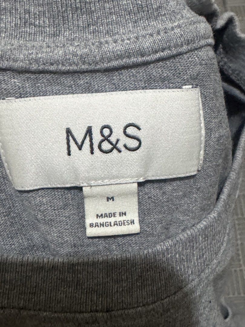 Marks & Spencer Basic Shirt (Category: Tshirts & Polo Shirts ) located in Imus. Submitted by eiramaejela2615 (Listing ID 1463739837, Image 2). Description: - Grey basic tee - Short sleeves - Chest pocket - EUC, rarely used - bought @ ₱1250.