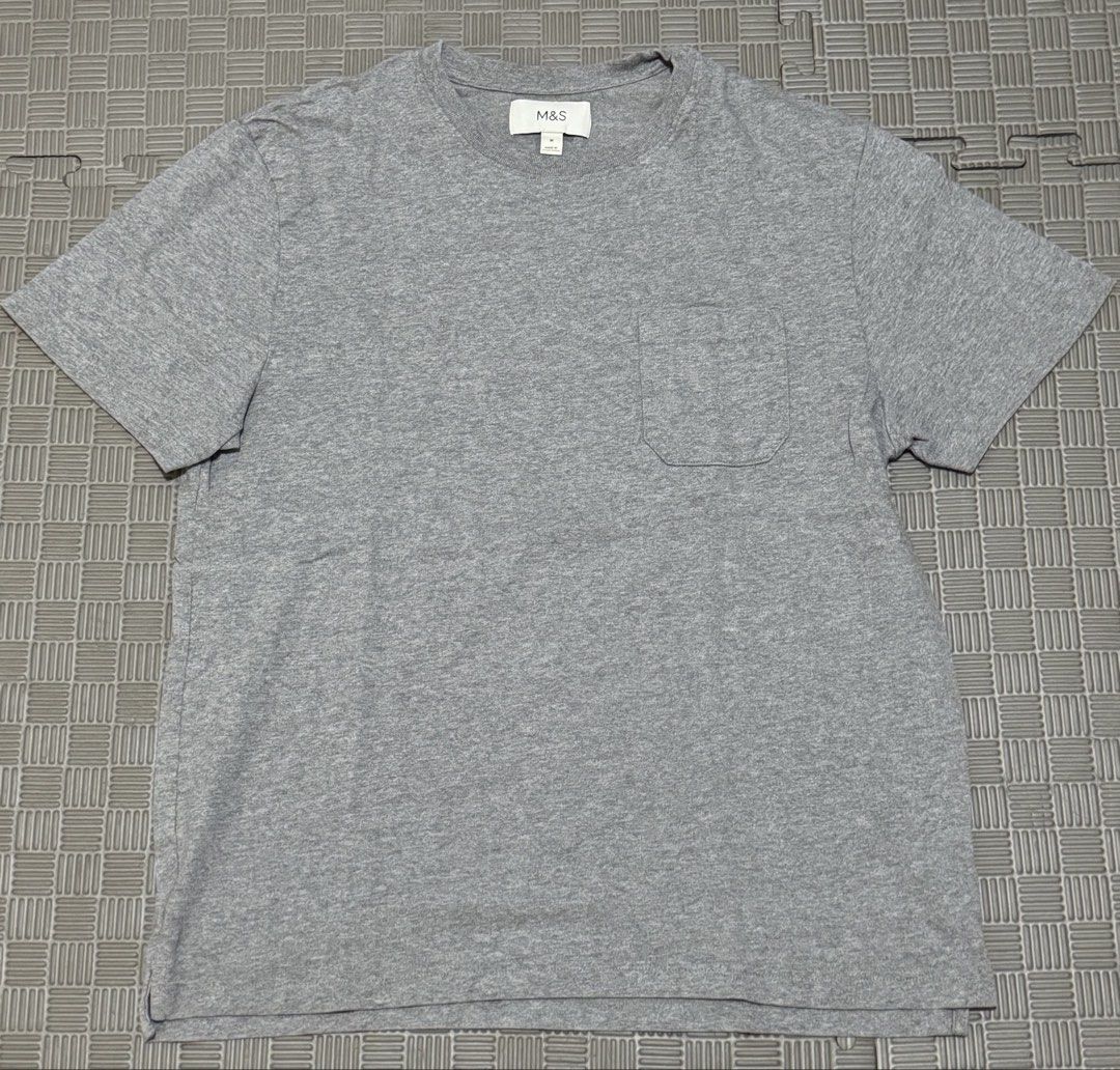 Marks & Spencer Basic Shirt (Category: Tshirts & Polo Shirts ) located in Imus. Submitted by eiramaejela2615 (Listing ID 1463739837, Image 1). Description: - Grey basic tee - Short sleeves - Chest pocket - EUC, rarely used - bought @ ₱1250.