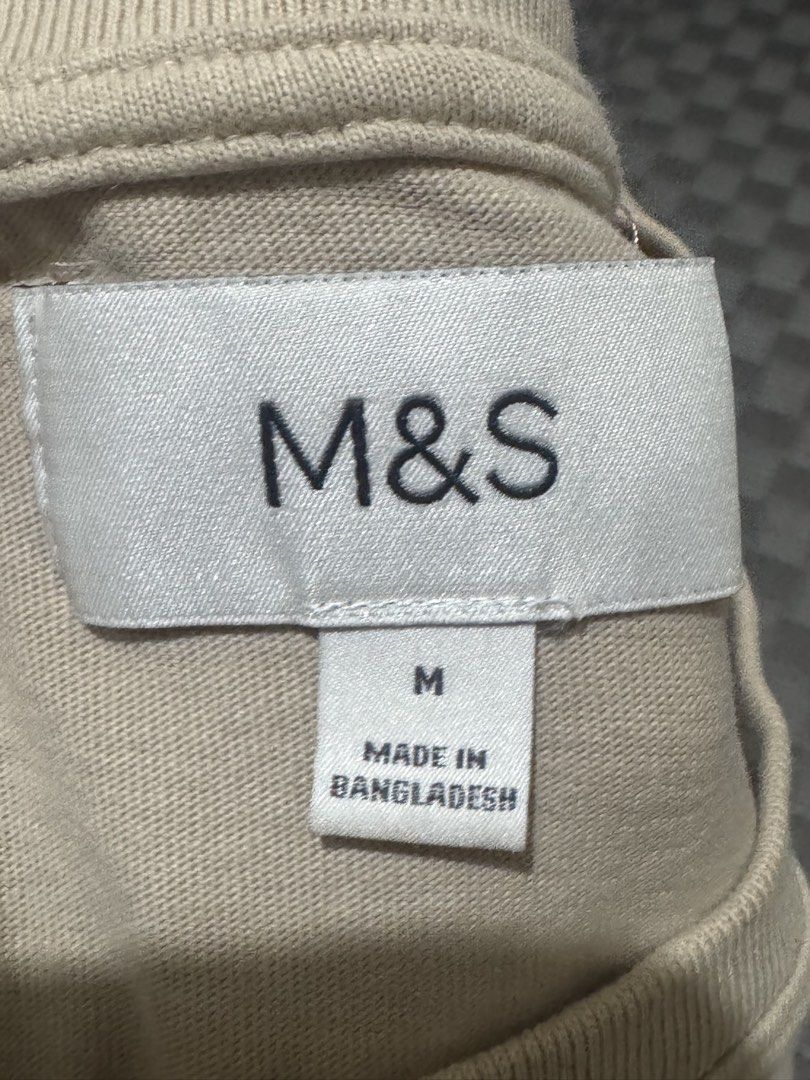 Marks & Spencer Shirt (Category: Tshirts & Polo Shirts ) located in Imus. Submitted by eiramaejela2615 (Listing ID 1463739241, Image 2). Description: - M&S Beige T-shirt - Size: Medium (M) - Fit: Regular - Features: Chest pocket - VGUC - Rarely used - Bought @ ₱1250.